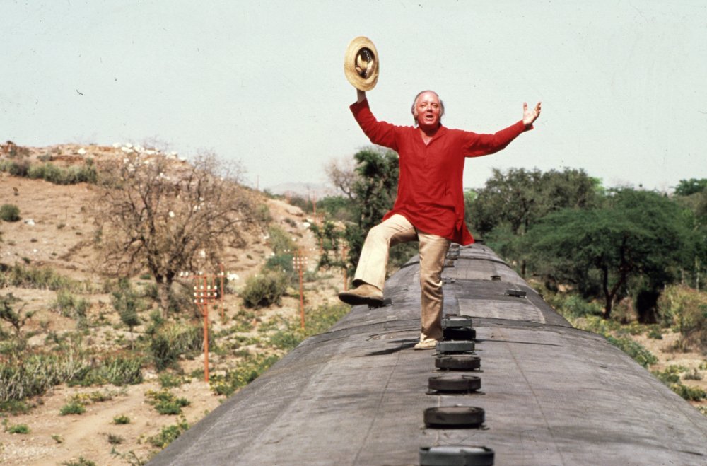 Richard Attenborough dancing atop a steam train on location for Gandhi (1982)